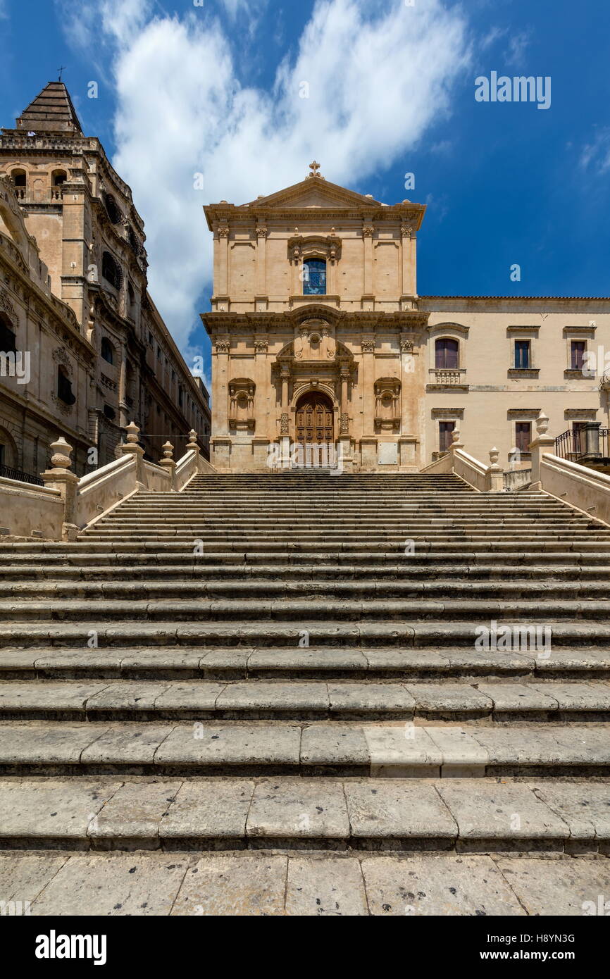 18th century Church of Saint Francis Immaculate in Noto, Sicily, Italy stands on top of an impressive staircase Stock Photo