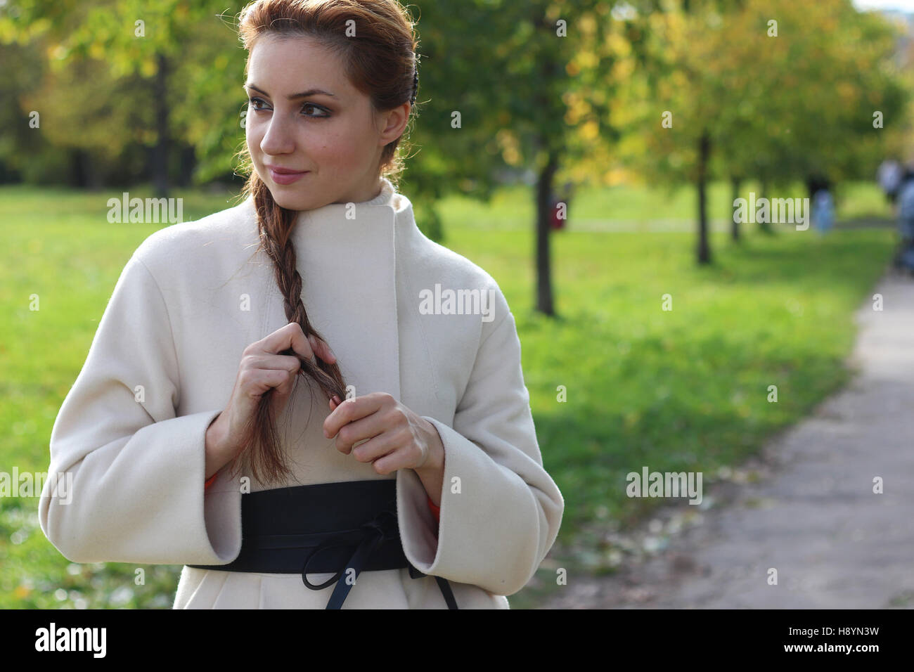 girl walking in the park in autumn Stock Photo - Alamy