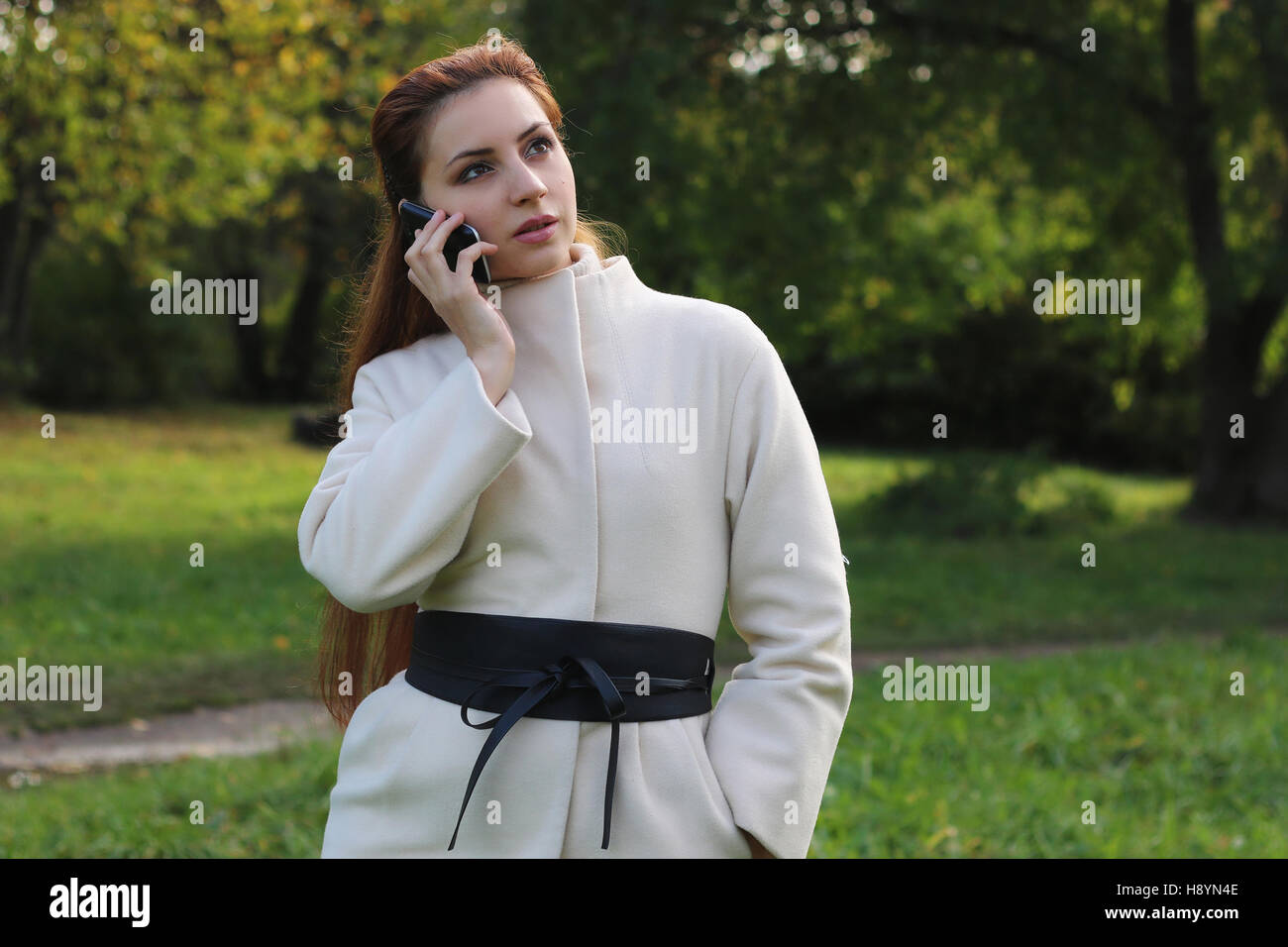 girl walking in the park in autumn Stock Photo - Alamy