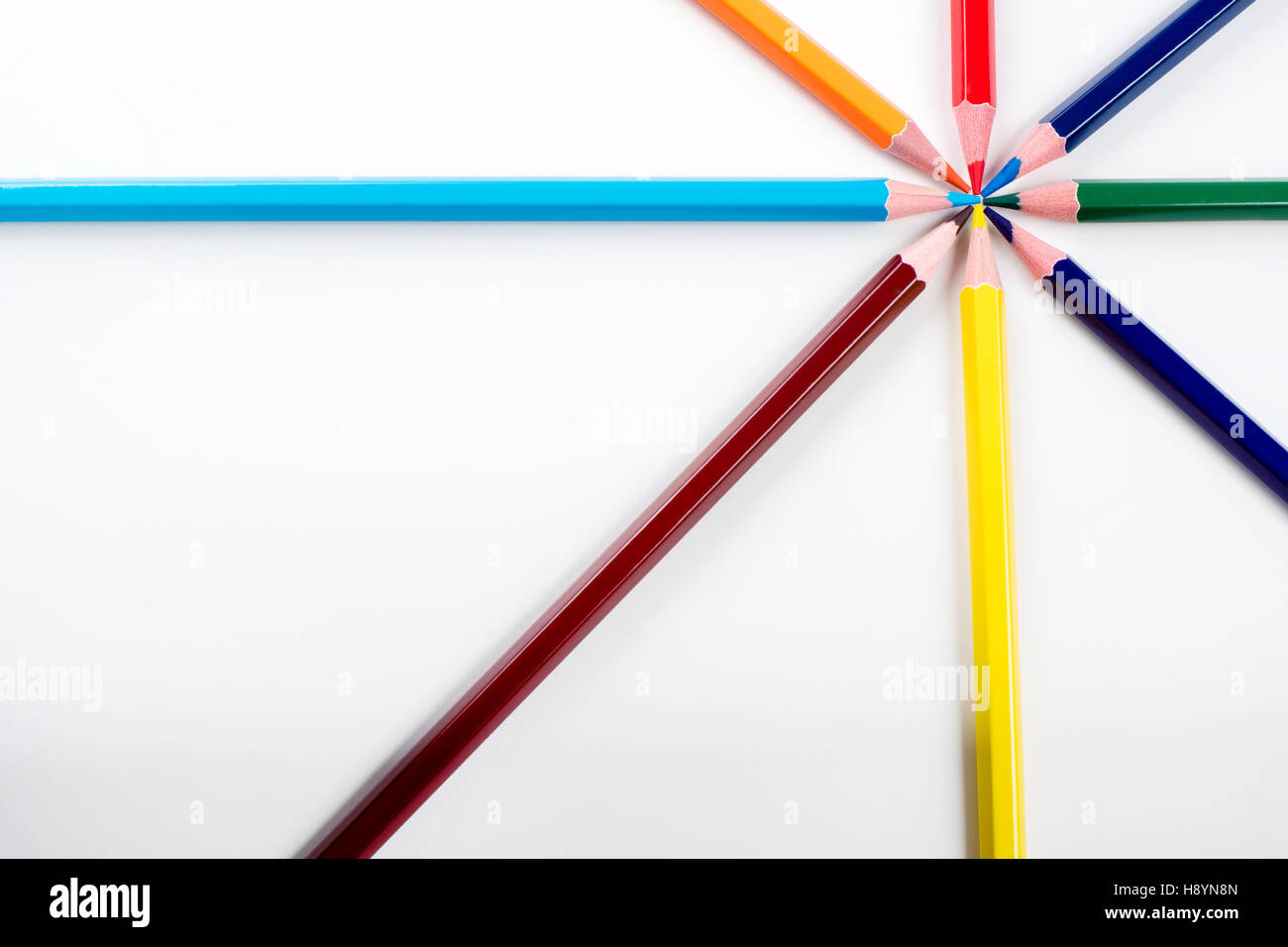 Colored pencils arranged in a star shape in natural light Stock Photo ...