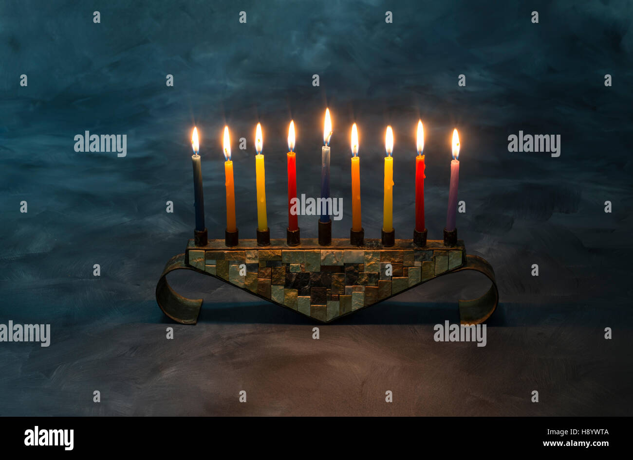 Menorah with burning candles for Hanukkah in dark Stock Photo Alamy
