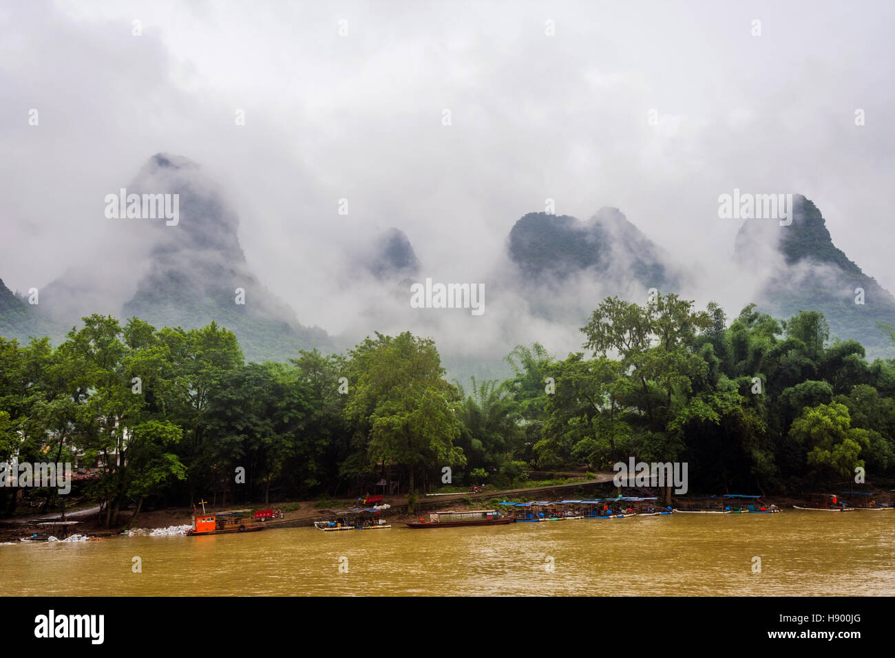 Bamboo rafts on Li river surrounded by karst mountains, Guilin, China Stock Photo