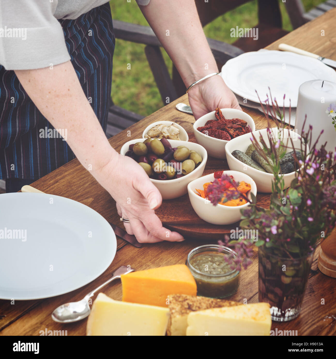 Woman Preparing Table Dinner Concept Stock Photo - Alamy