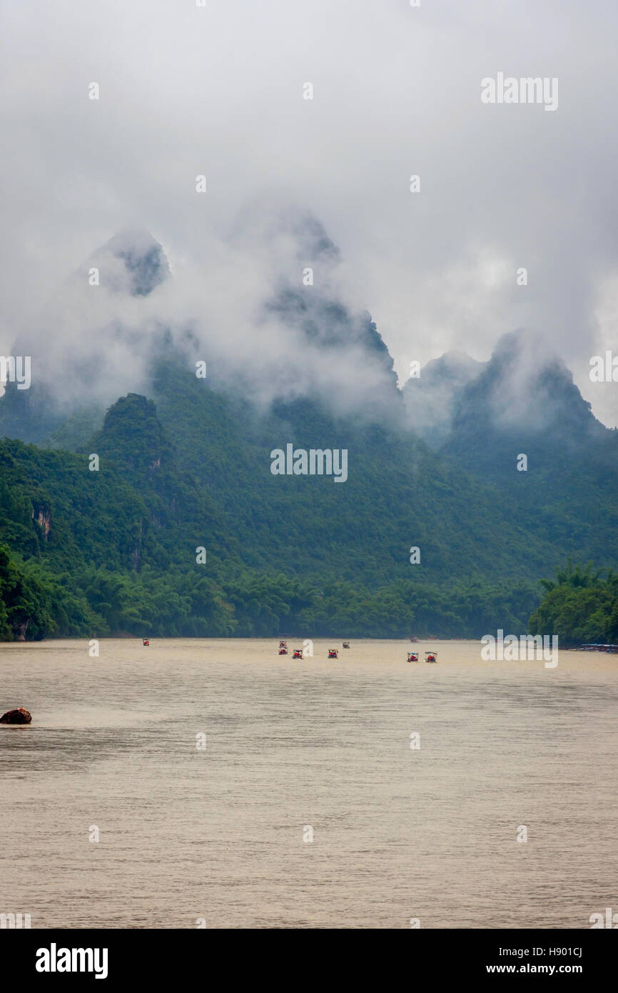 Bamboo rafts on Li river surrounded by karst mountains, Guilin, China Stock Photo