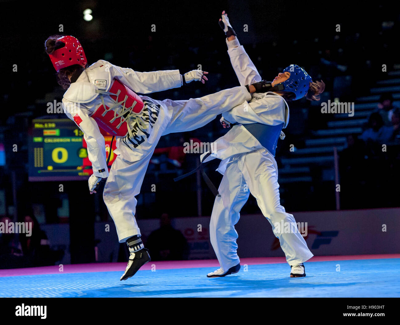 Burnaby, Canada. 16th Nov, 2016. WTF World Taekwondo Junior Championships, Maria Calderon (CRC) blue and Thi Kim Ngan Ho (VIE) red, compete in female 44kg class gold medal match. Ho took the gold medal Credit:  Peter Llewellyn/Alamy Live News Stock Photo