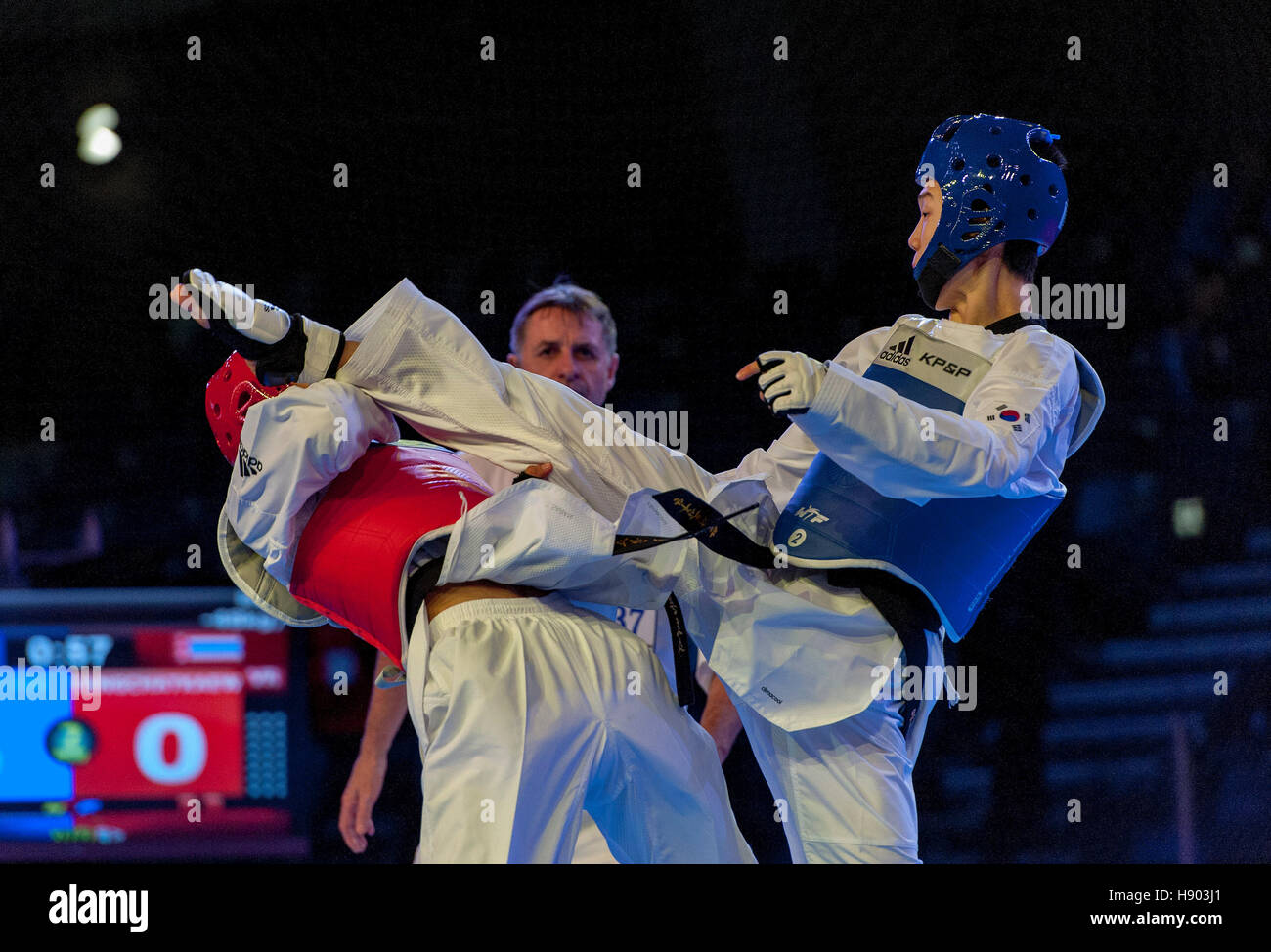 Burnaby, Canada. 16th Nov, 2016. WTF World Taekwondo Junior Championships, Jae-hee Mok (KOR) blue and Saran Tangchatkaew (THA) red, compete in male 48kg class gold medal match. Mok took the gold medal Credit:  Peter Llewellyn/Alamy Live News Stock Photo