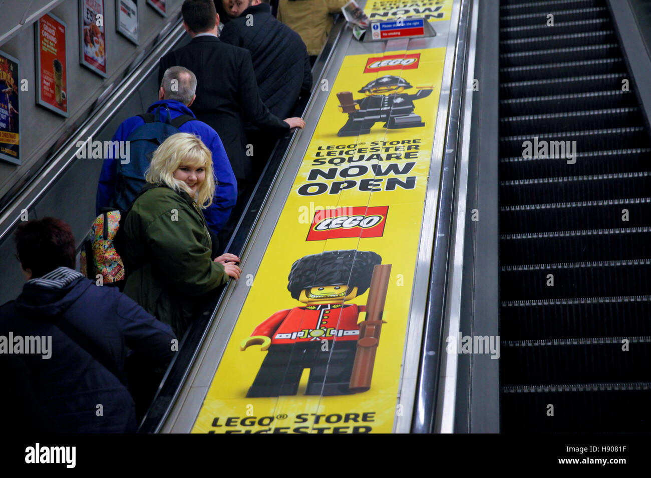 Leicester Square, London, UK. 17th Nov, 2016. LEGO stickers on the underground escalators at Leicester Square. Mayor of London, Sadiq Khan joins John Goodwin, Chief Financial Officer, The LEGO Group opens world's largest Lego store in Leicester Square, featuring iconic models, new technology and a tea-loving mascot. The new store features exclusive LEGO sets including Ð hands-on building area, building demonstration, Pick & Build Brick Wall and a life size London Underground tube carriage build in partnership with TfL, which is made up of 637,903 bricks Credit:  Dinendra Haria/Alamy Live News Stock Photo