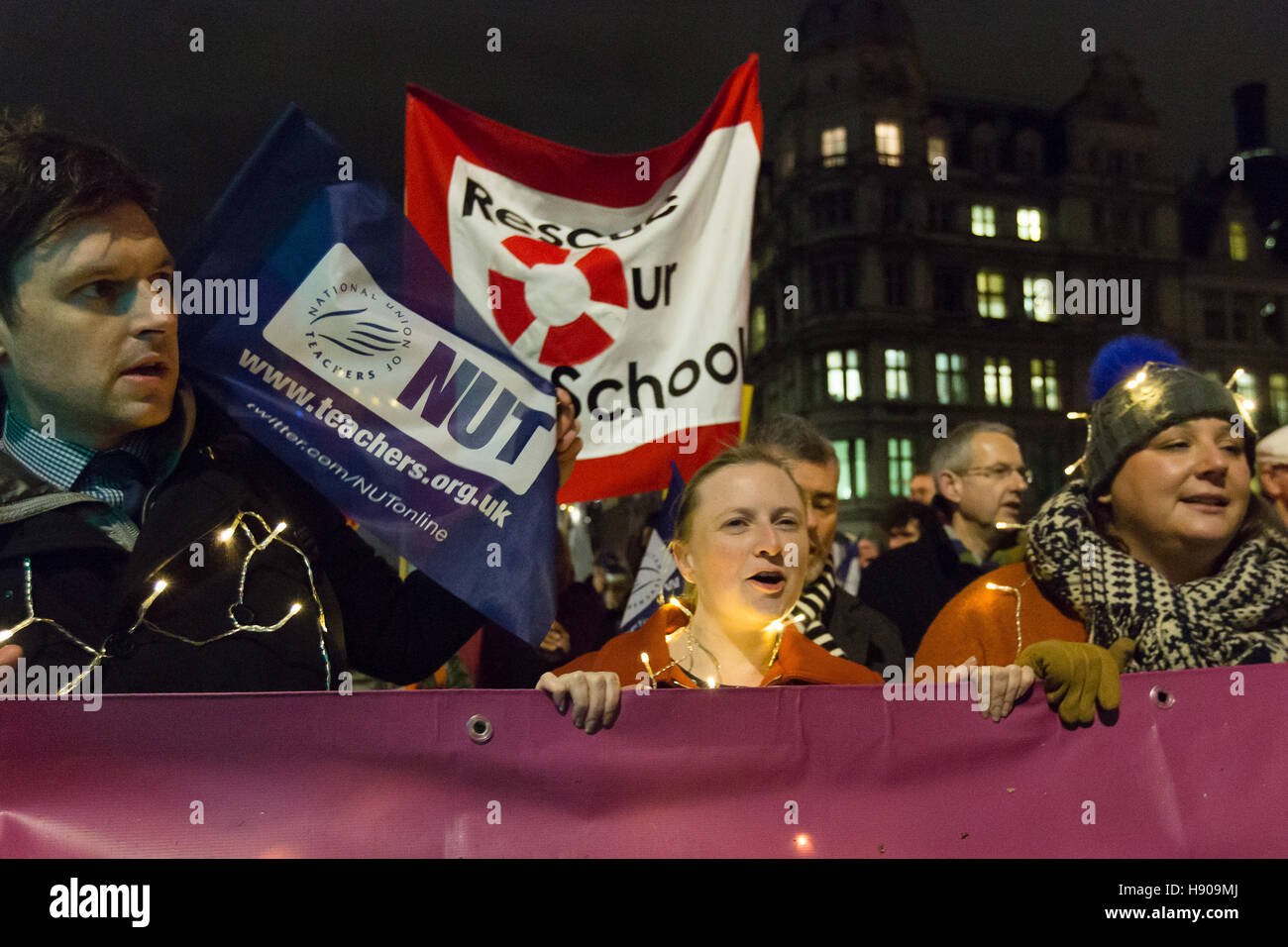 London, UK. 17th Nov 2016. Protesters march down Whitehall. Teachers from the National Union of Teachers (NUT), school governors and support staff stage a protest rally against government cuts in education funding outside Downing Street in Westminster before marching to the Department for Education this evening. Protesters are demanding and increase in education funding in the upcoming budget to ensure that every child gets the best education. Credit:  Vickie Flores/Alamy Live News Stock Photo