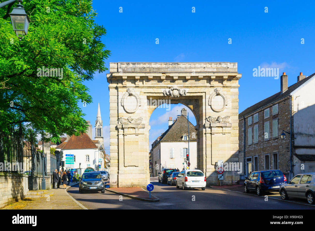 BEAUNE, FRANCE - OCTOBER 15, 2016: Scene of the St. Nicolas gate, with locals and visitors, in Beaune, Burgundy, France Stock Photo