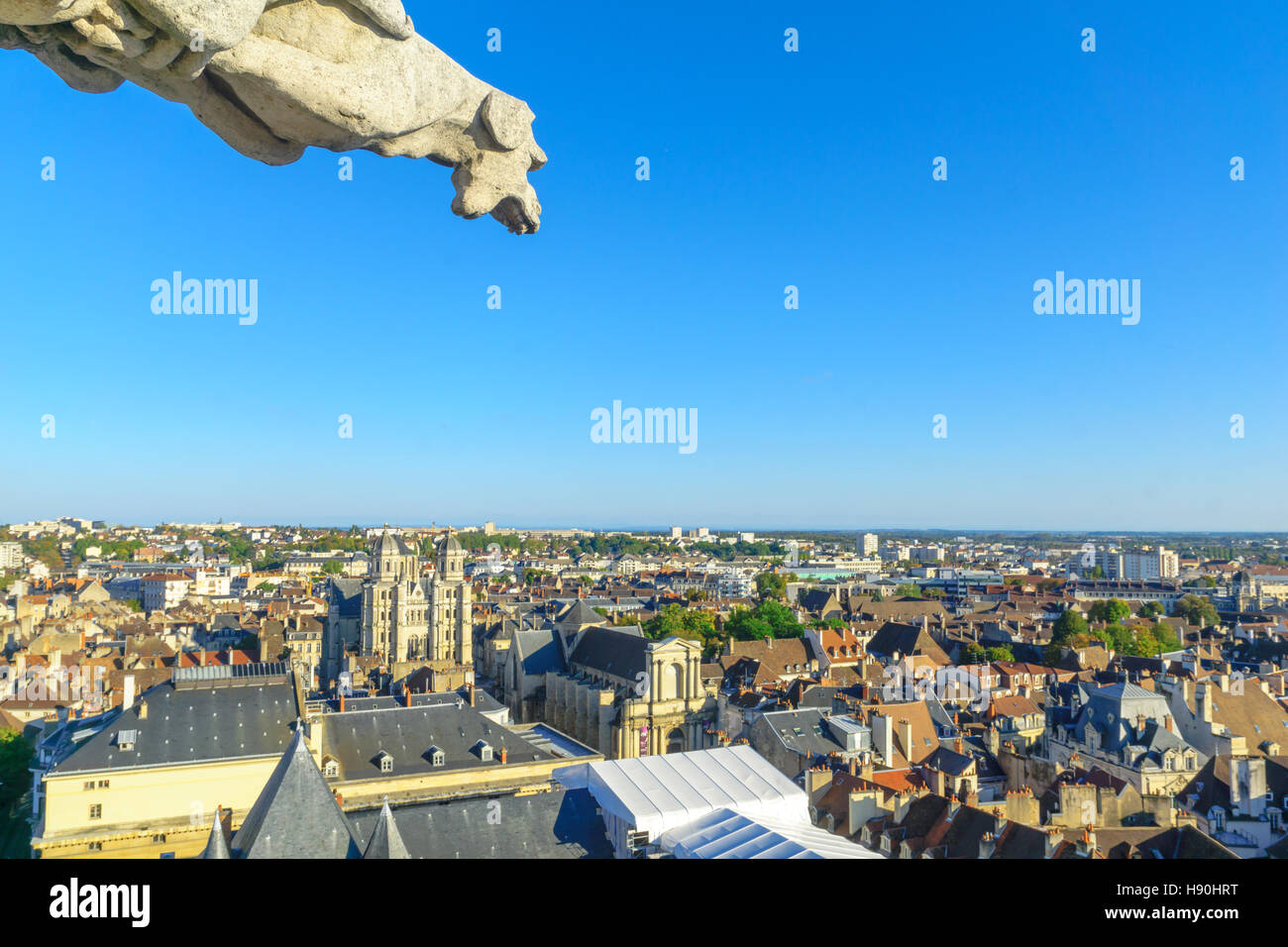 DIJON, FRANCE - OCTOBER 15, 2016: An aerial view of the historic center of the city, with a Gargoyle and the St. Michel church, in Dijon, Burgundy, Fr Stock Photo