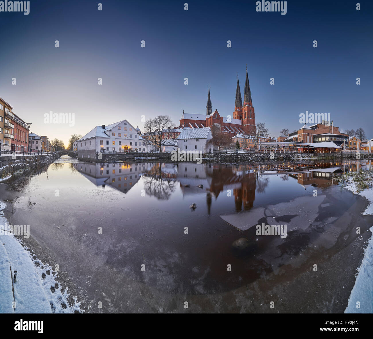 The Cathedral and the Fyris river (Fyrisan) in the winter at Christmas time, Uppsala, Sweden, Scandinavia Stock Photo