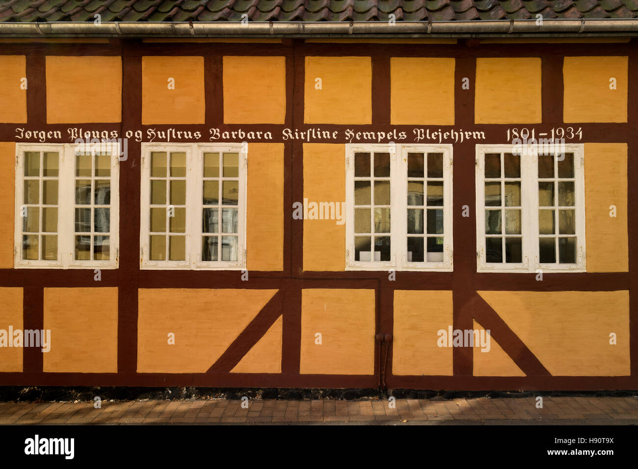 Traditional built house with a text in the city of Denmark
