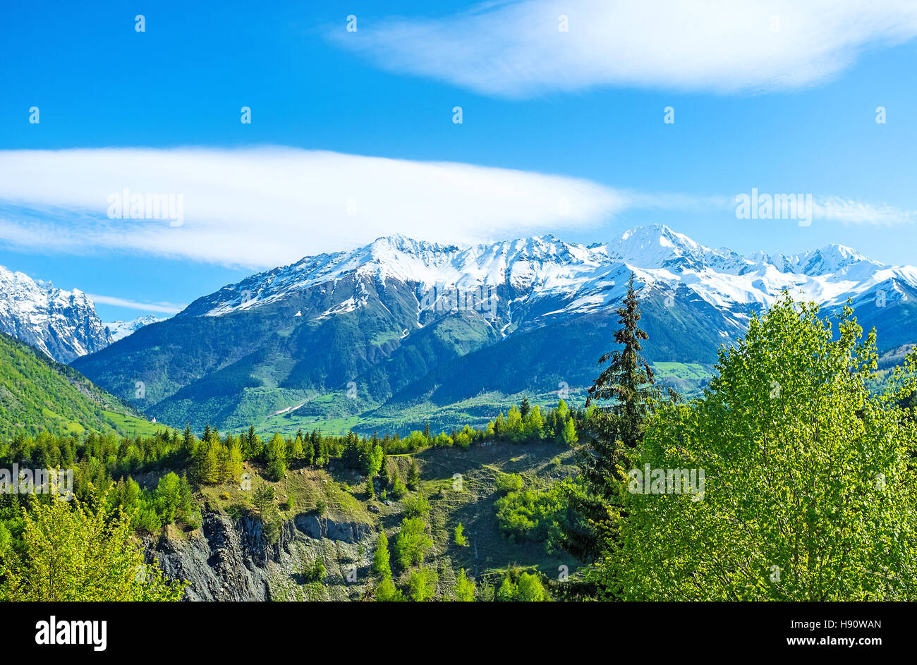 The scenic snowy peaks of Latsga and Gistola mountains of Great Caucasus,  Samegrelo-Zemo Svaneti, Georgia. Stock Photo