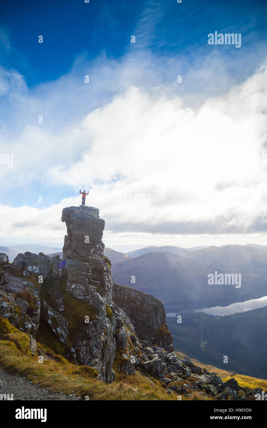 A walker on the top of the Cobbler Mountain Scotland. Stock Photo