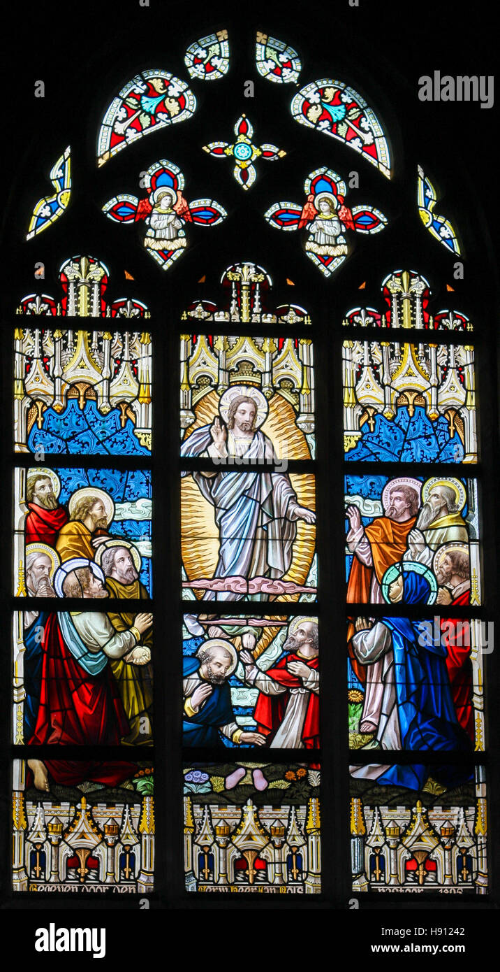 Stained Glass window depicting the Ascension of Jesus Christ in the Church of Alsemberg, Belgium. Stock Photo