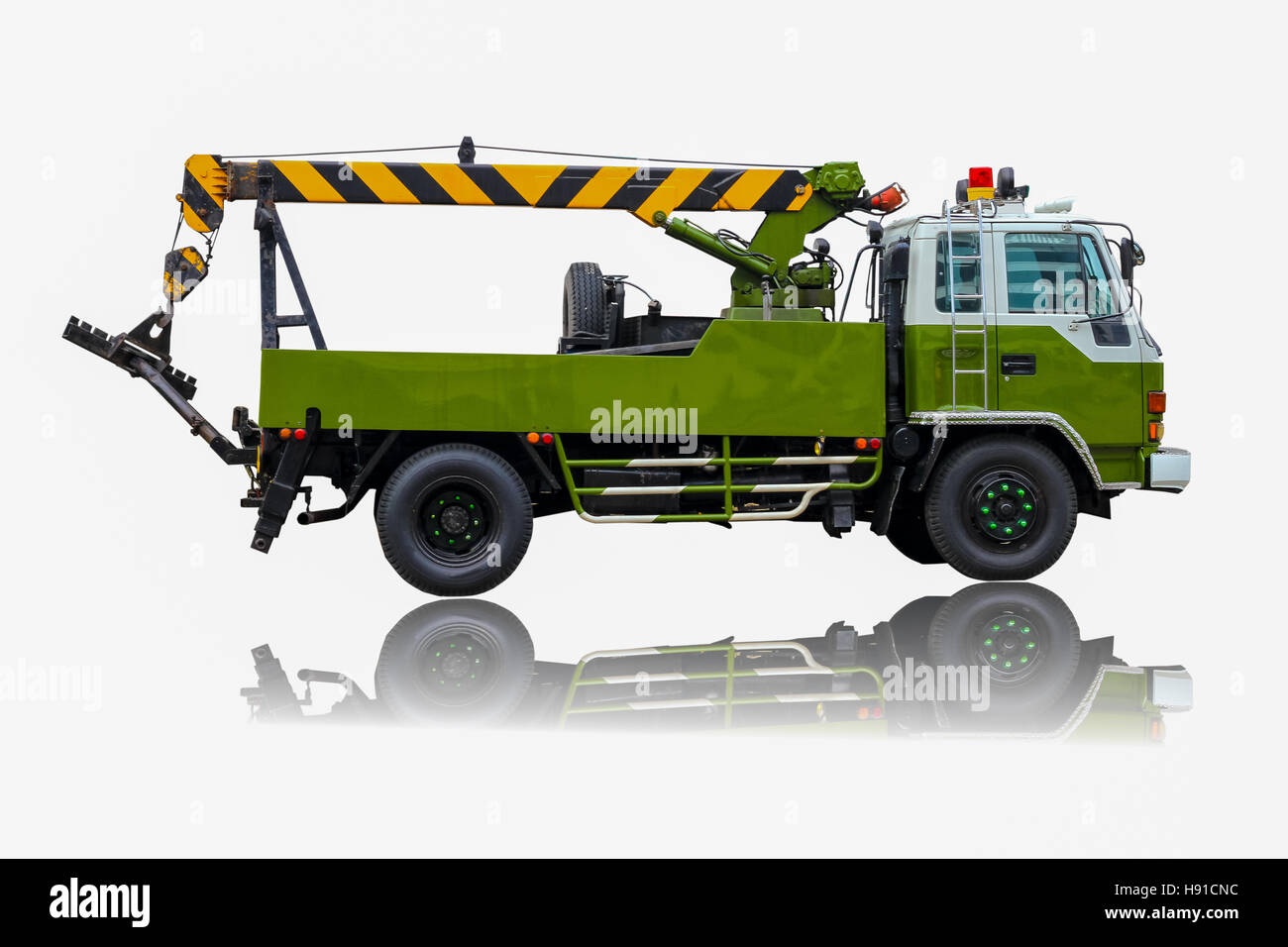 Green Truck or truck crane with lift in factory Stock Photo Alamy