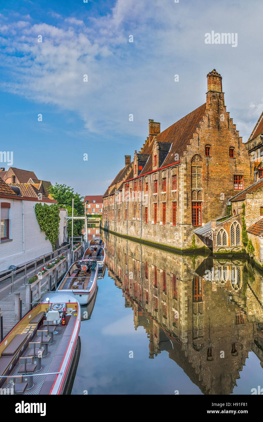 Boats and Reflections Along The Canal Bruges Belgium Stock Photo