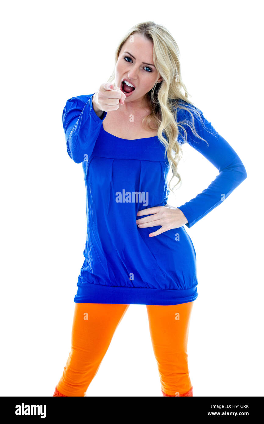 Girl Looking at the Camera Shouting and Pointing Wearing a Short Blue Mini Dress and Orange Legging Stock Photo