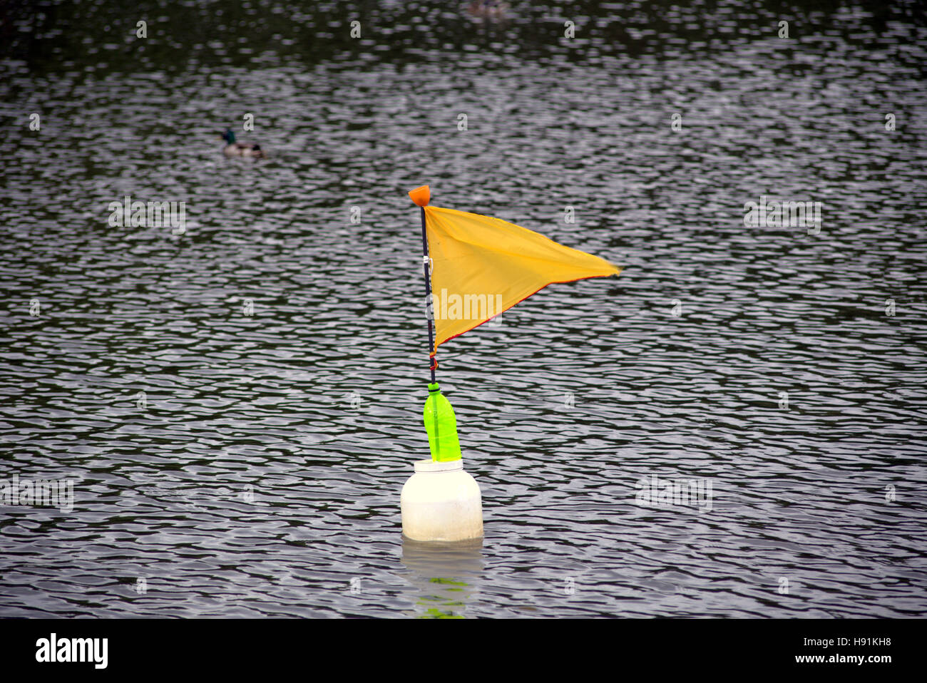 marker buoy for model boat race on pond Stock Photo
