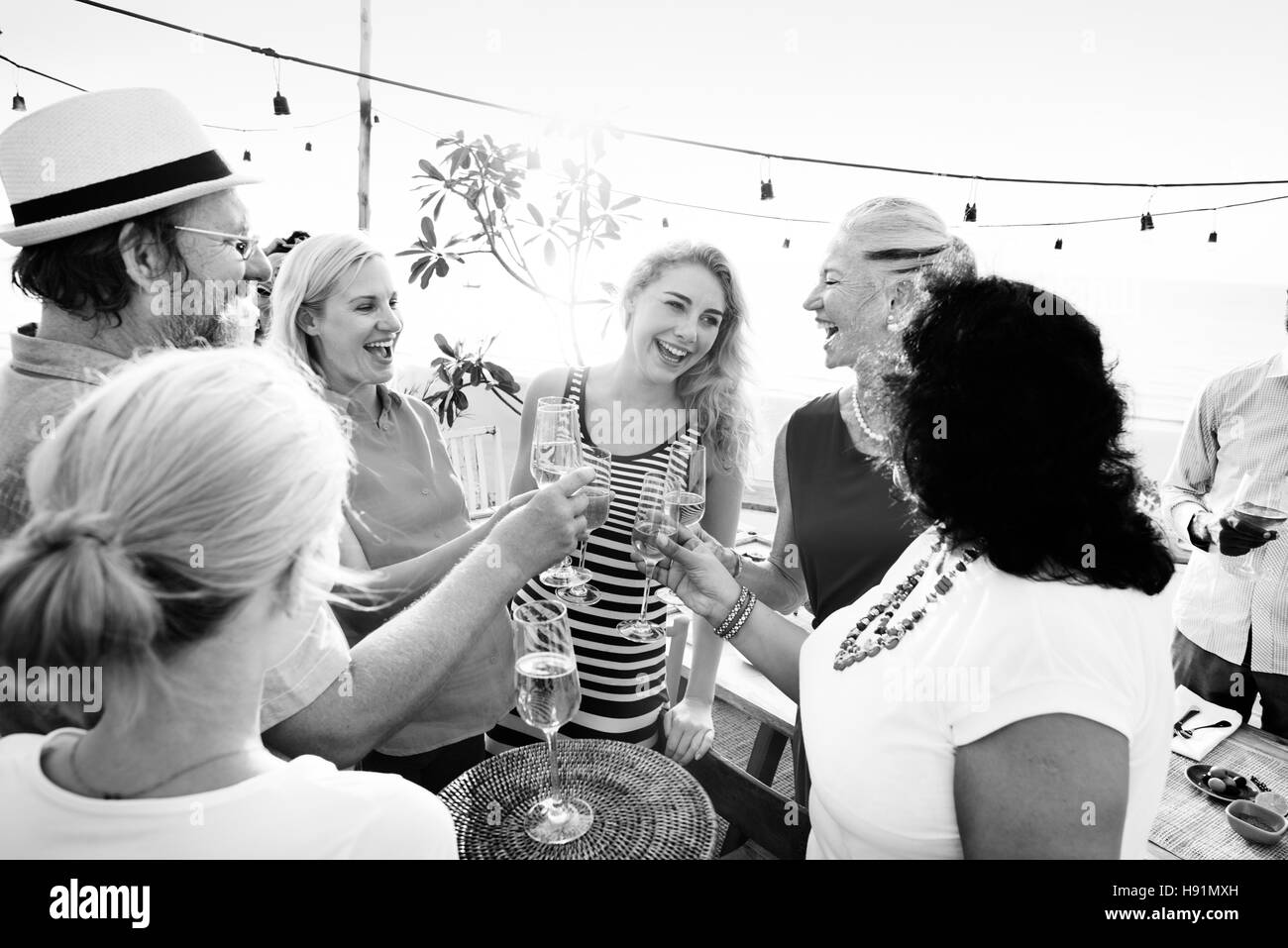 Diverse group people eating Black and White Stock Photos & Images - Alamy