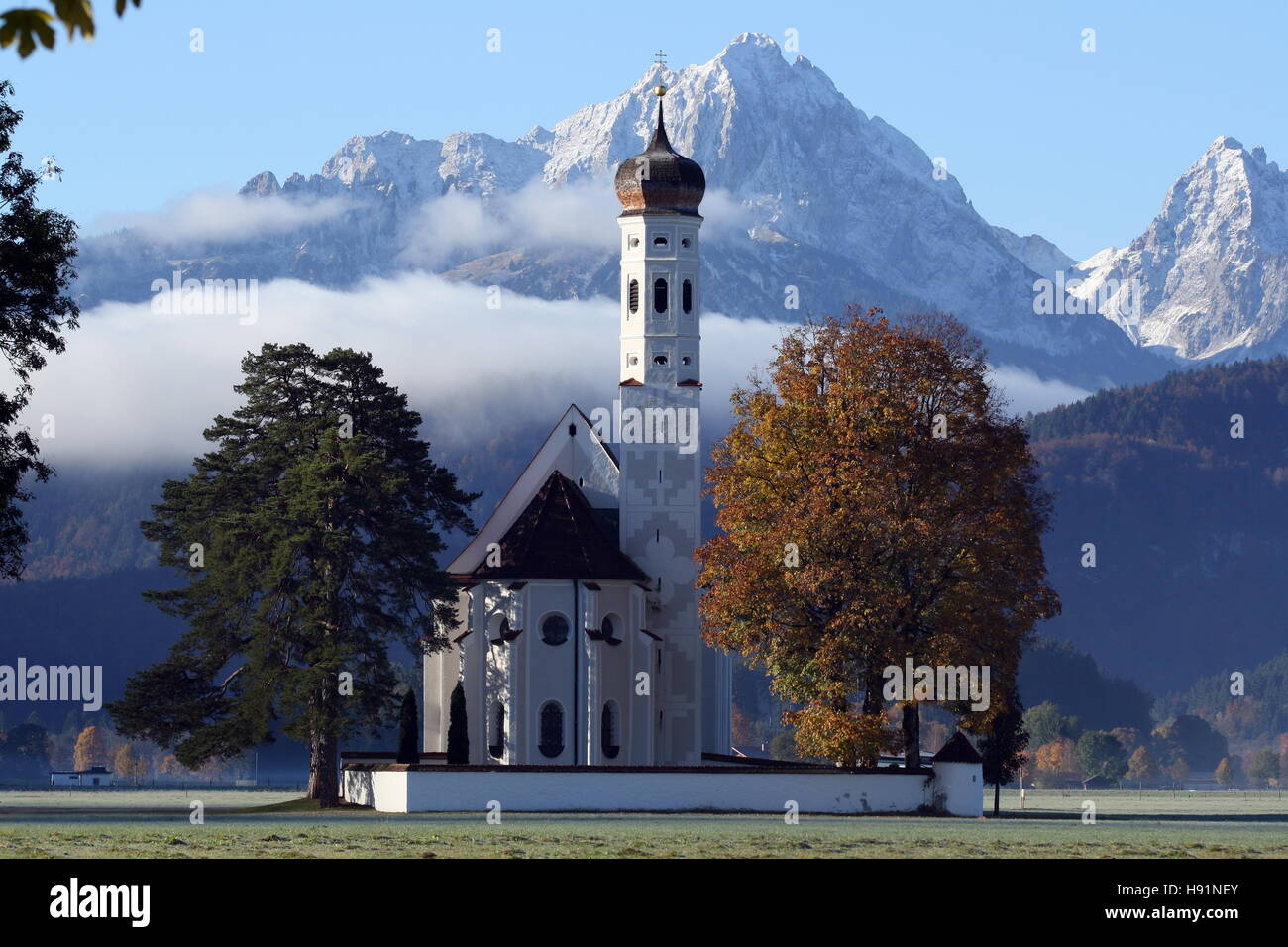 St.Coloman church in front of the Bavarian Alps Stock Photo - Alamy