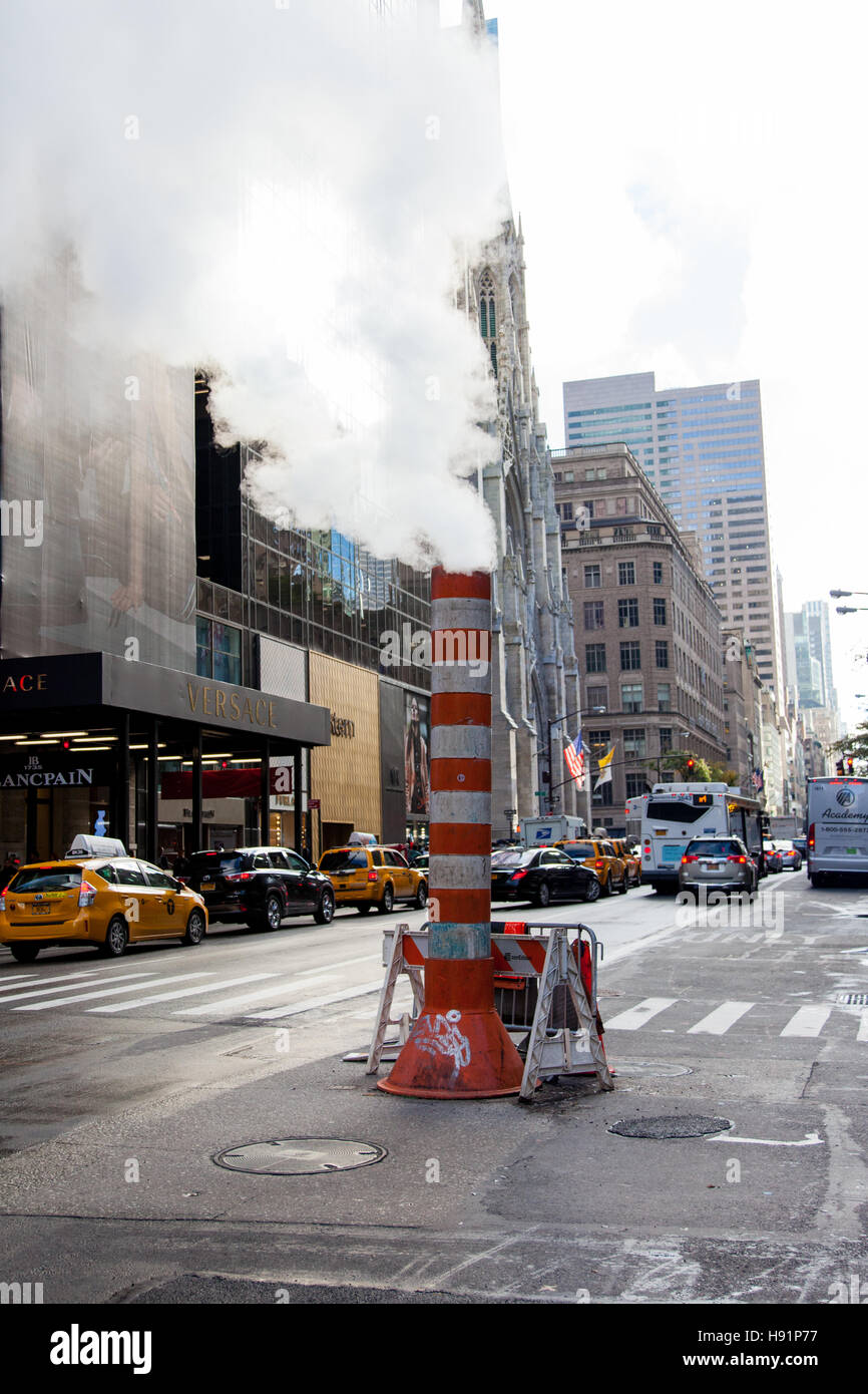 Steam escaping into the New York city street, Manhattan, New York, United States of America. Stock Photo