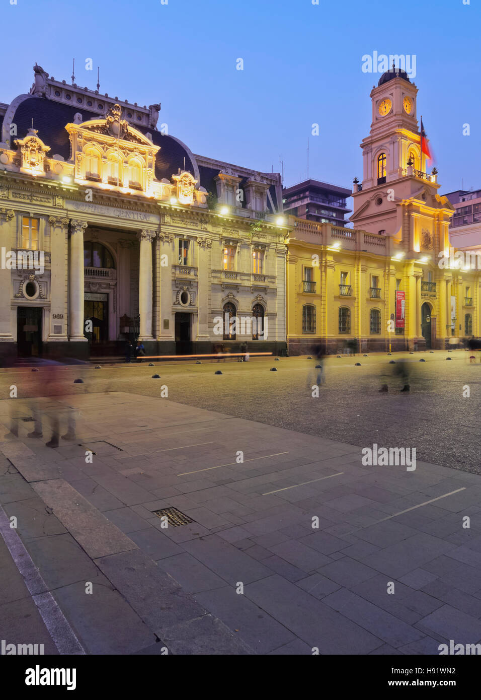 Chile Santiago Plaza de Armas Twilight view towards the Central Post Office Building and the Royal Court Palace housing Stock Photo