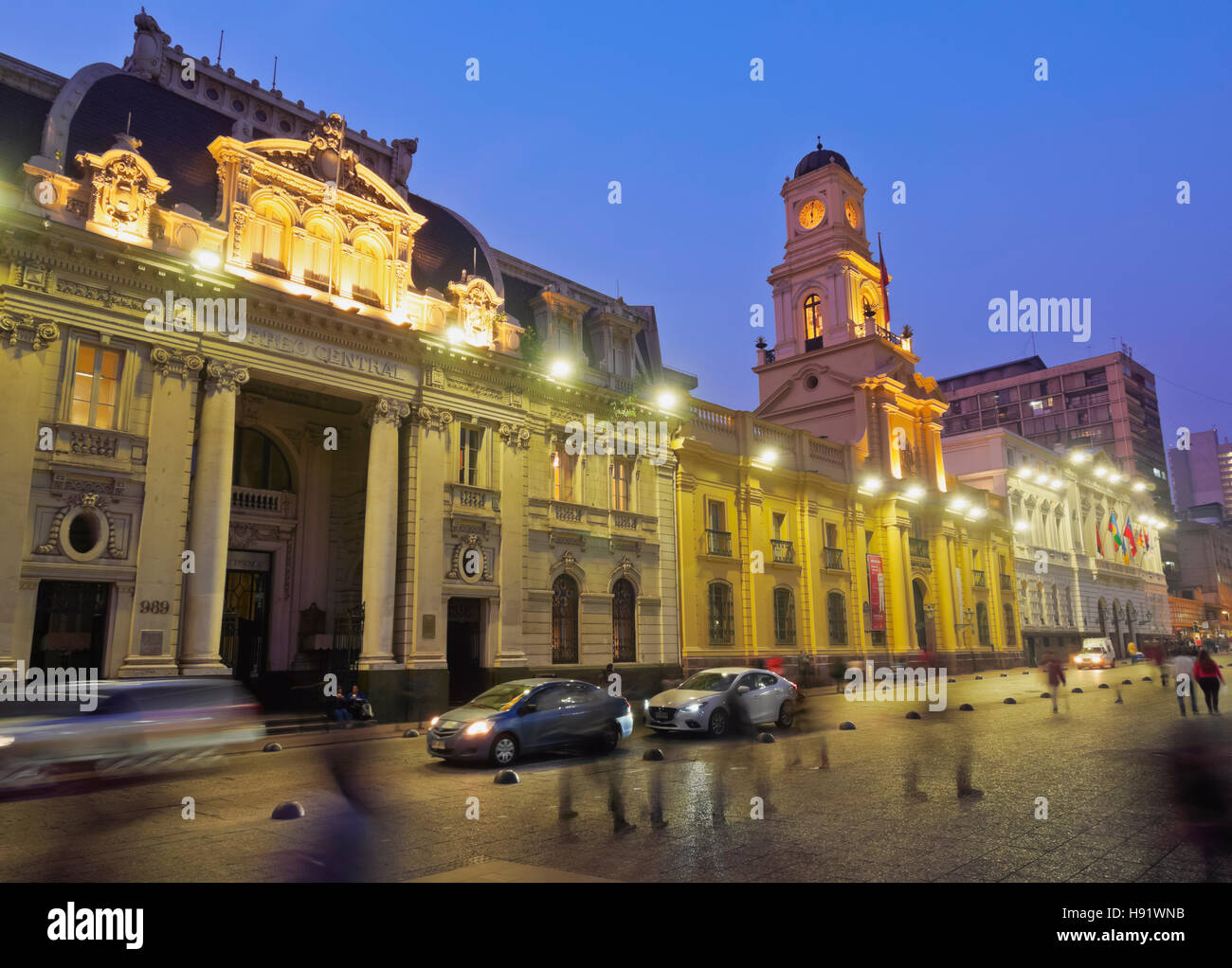 Chile Santiago Plaza de Armas Twilight view towards the Central Post Office Building and the Royal Court Palace housing Stock Photo