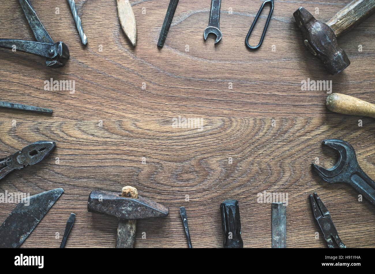 Rustic old used tools hammer wrench screwdriver nose plyers 24325941 Stock  Photo at Vecteezy