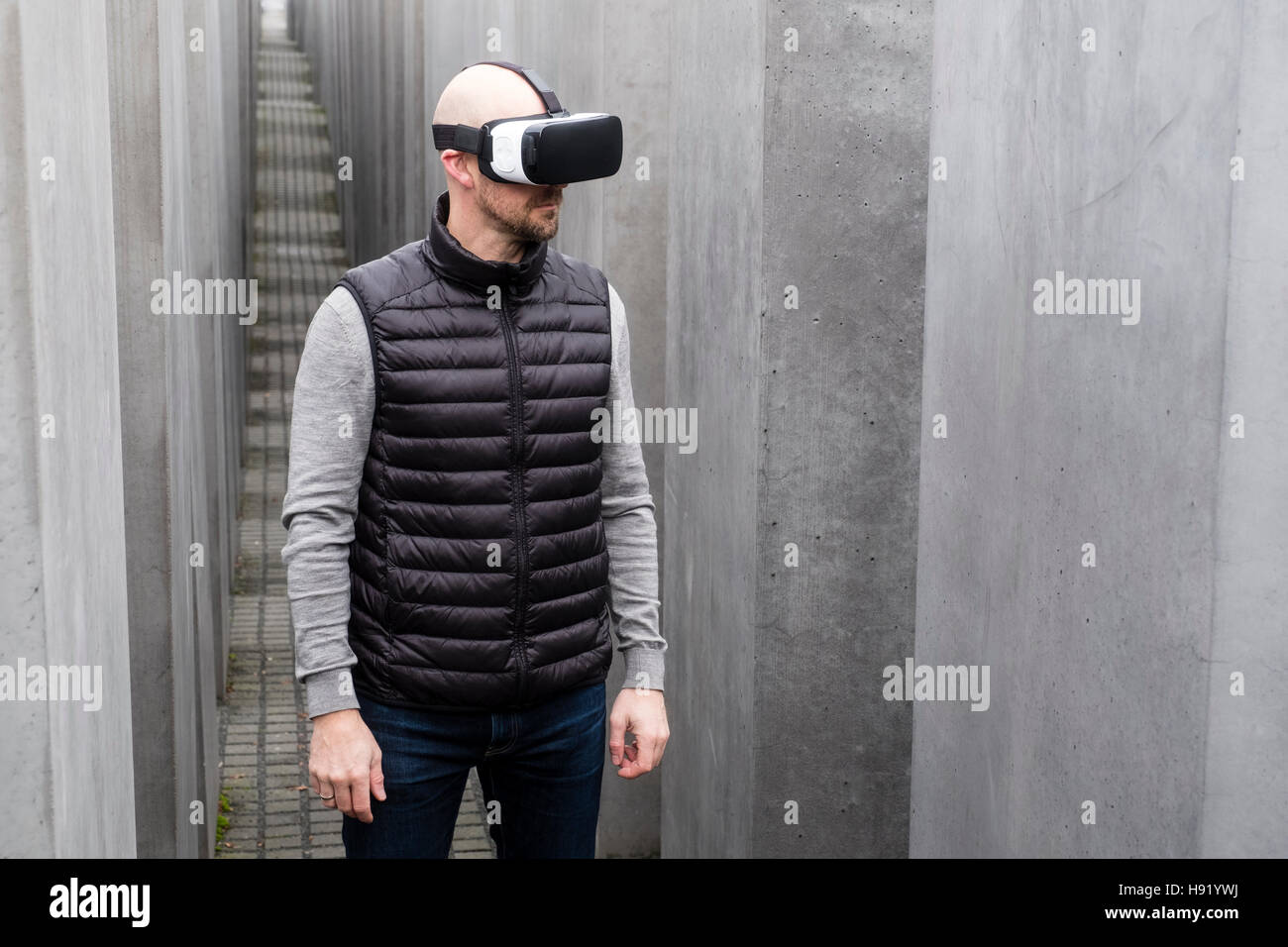 Man wearing VR virtual reality headset in Berlin Germany Stock Photo