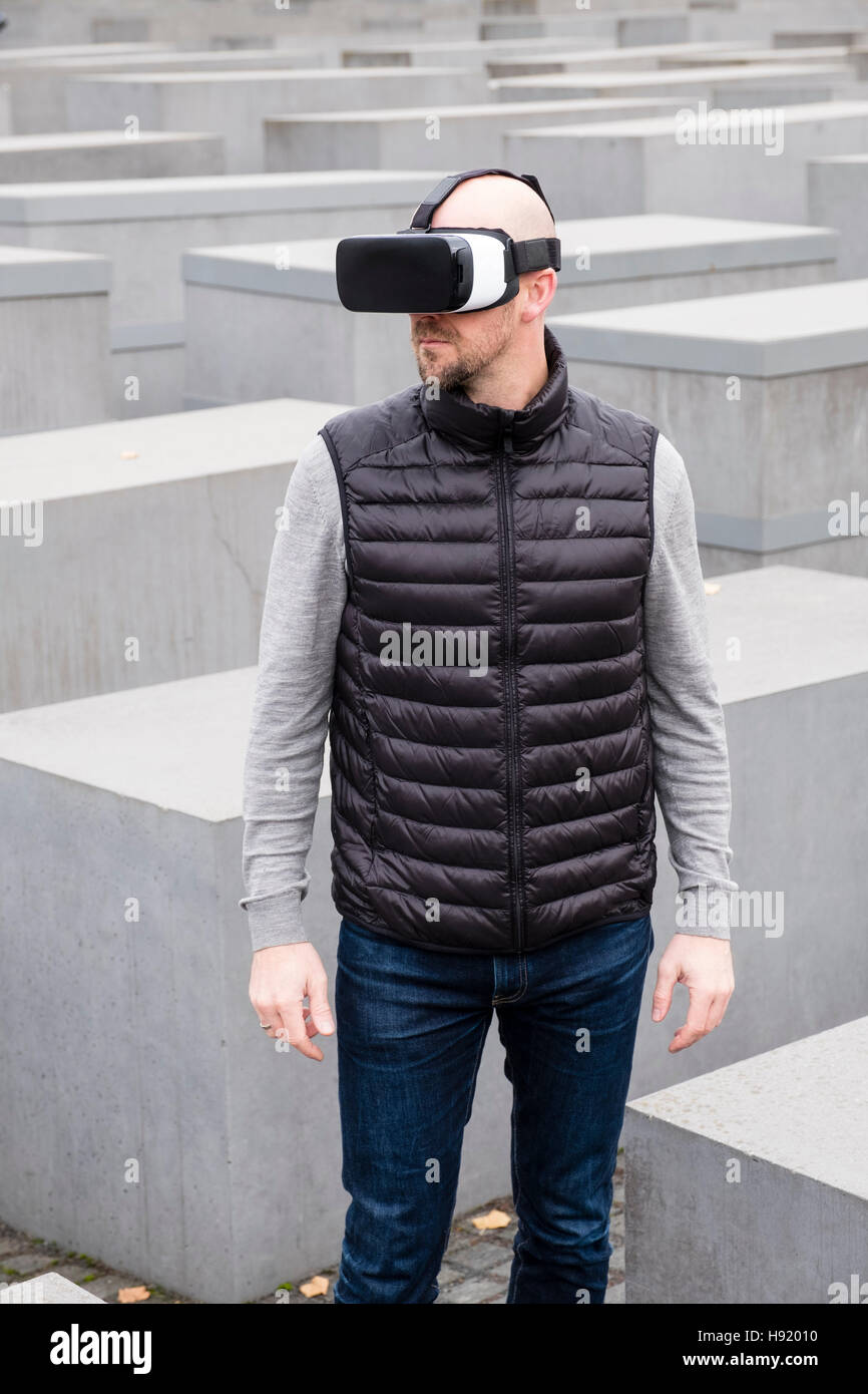 Man wearing VR virtual reality headset in Berlin Germany Stock Photo