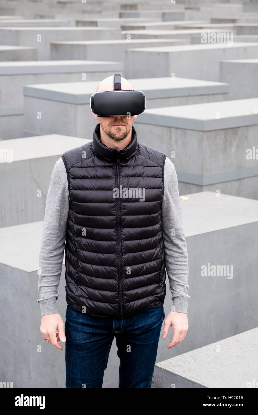 Man wearing VR virtual reality headset in Berlin Germany Stock Photo