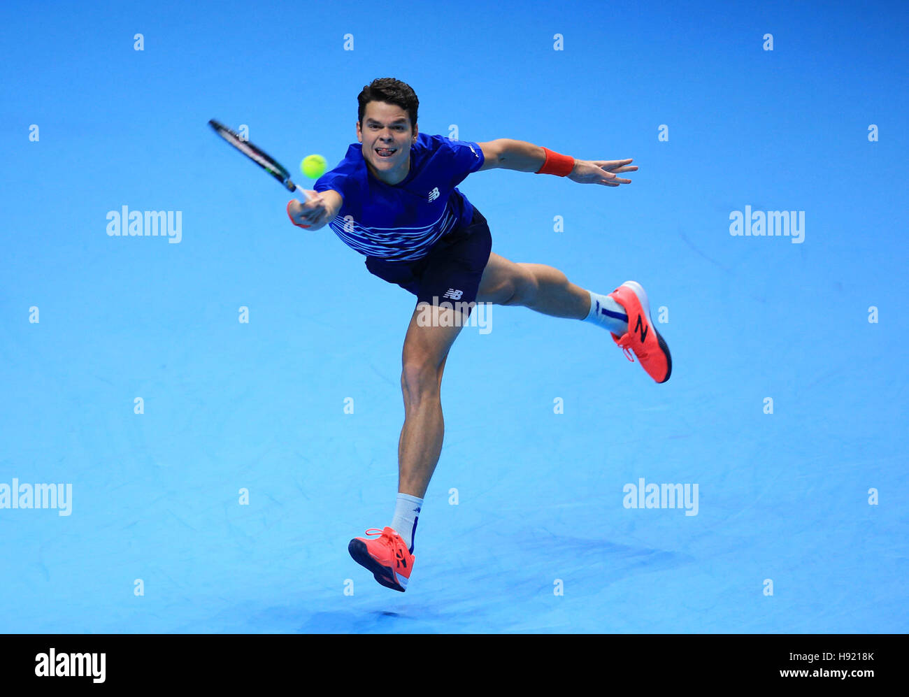Canada's Milos Raonic in action against Austria's Dominic Thiem during day five of the Barclays ATP World Tour Finals at The O2, London. Stock Photo