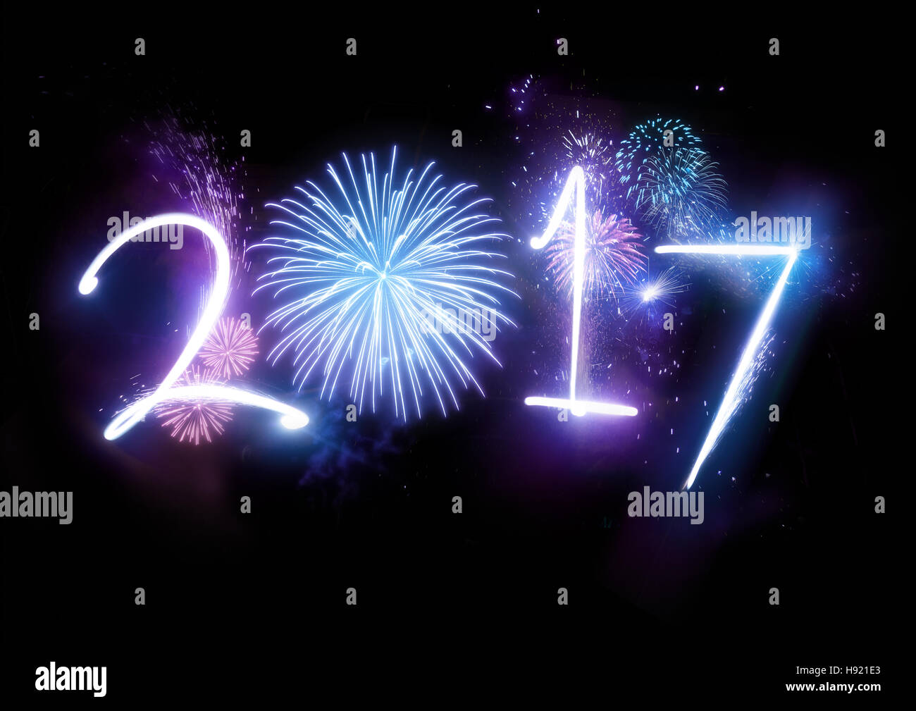Happy New Year Fireworks with the year 2017  lit up with fireworks and lights. Stock Photo