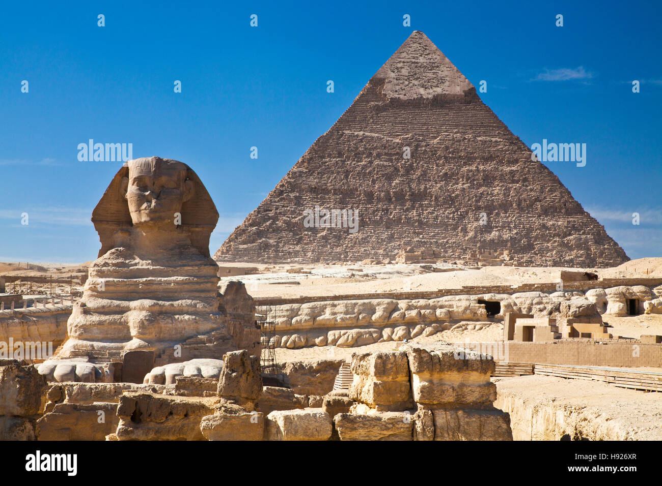 The Pyramid of Khafre or Chephren and the Sphinx at the necropolis on the Giza plateau near Cairo in Egypt. Stock Photo