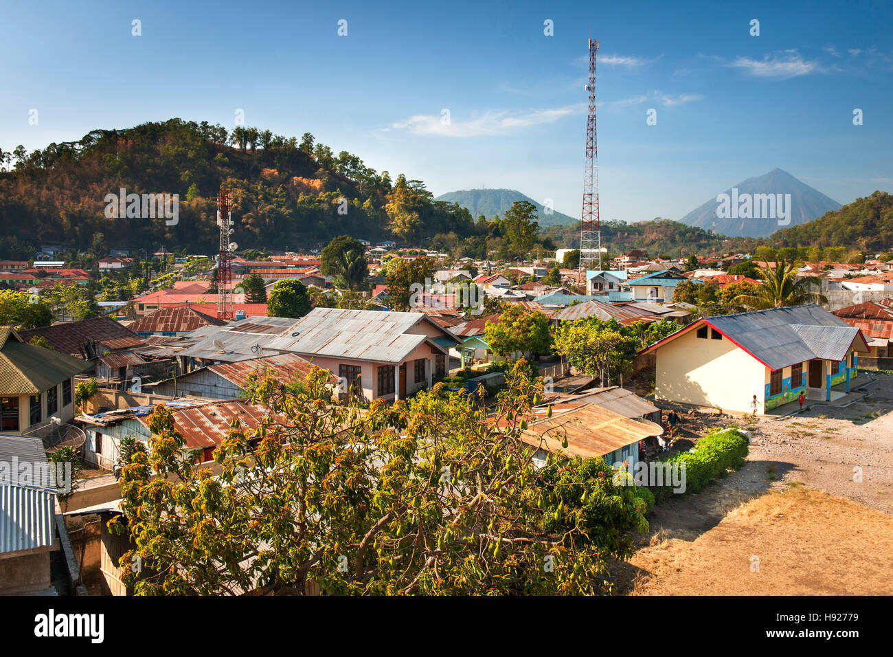 The town of Bajawa and Mount Inerie volcano on Flores island in Indonesia. Stock Photo