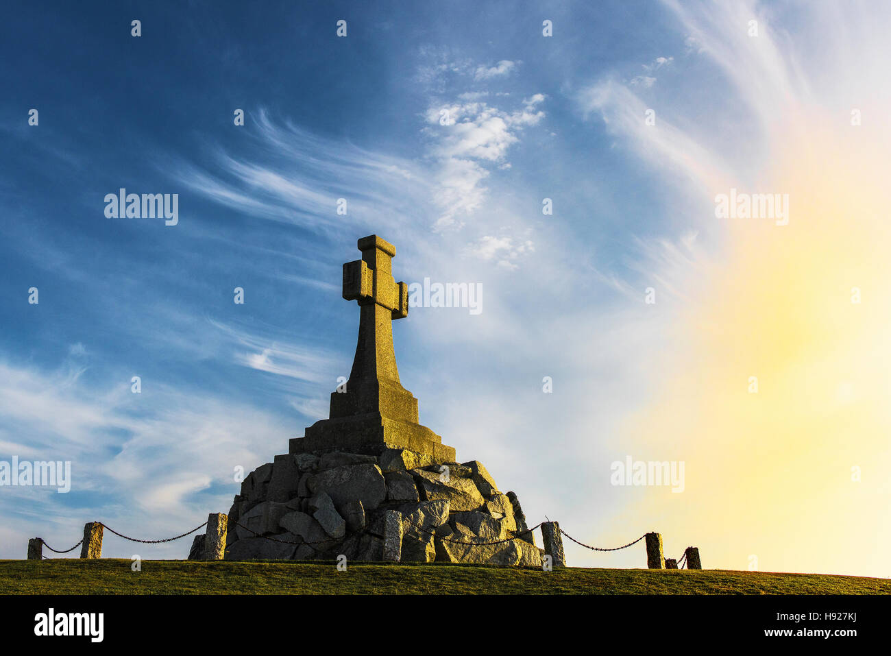 A spectacular sunset illuminates the Newquay War Memorial in Cornwall. Stock Photo