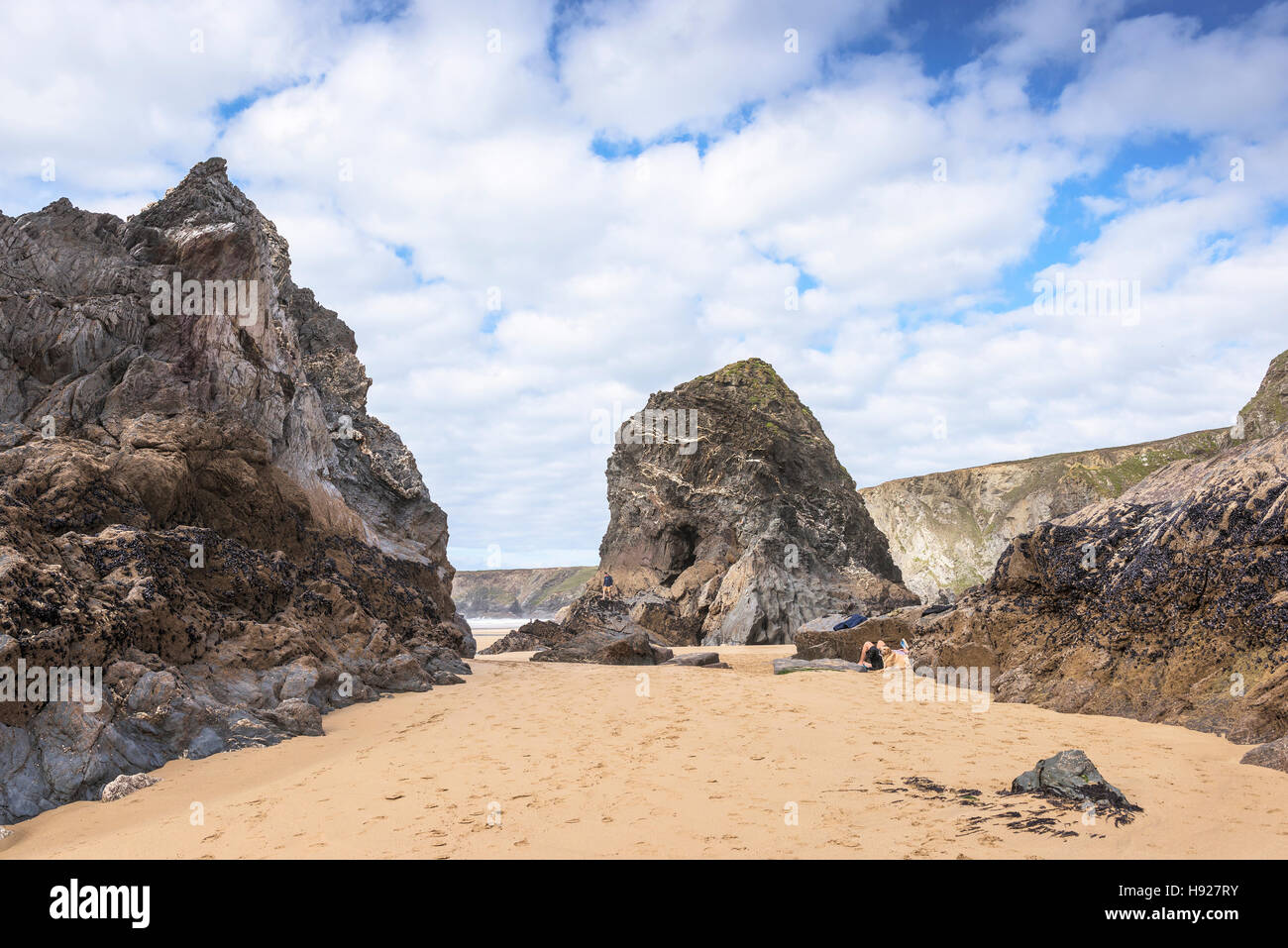 The iconic rock stacks at low tide at Bedruthan Steps in Cornwall. Stock Photo