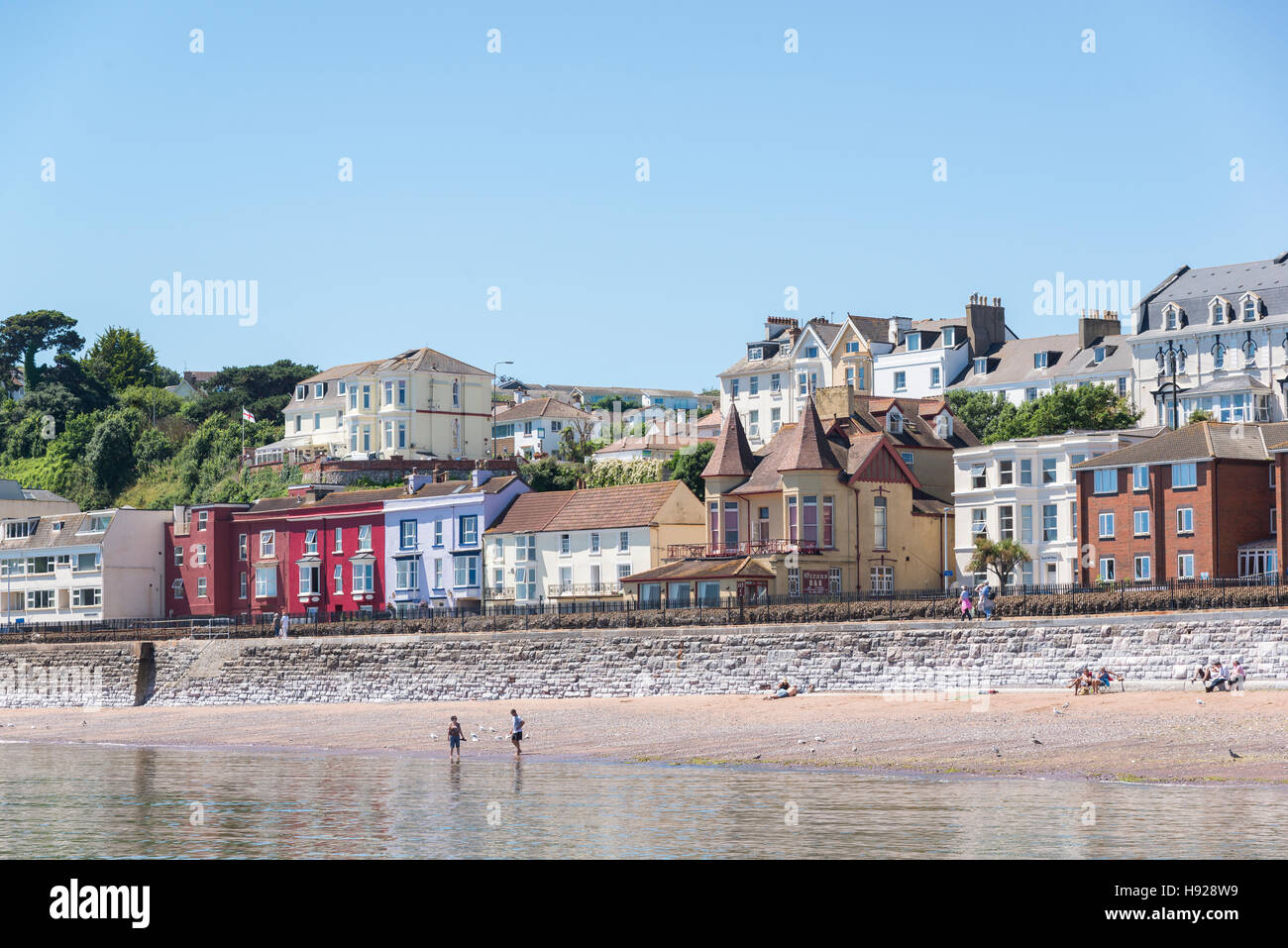 A view towards the beach and colourful houses of Dawlish Stock Photo