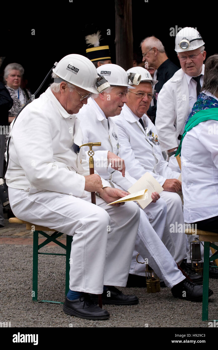 Germany,  Ruhr area, Witten, miners with work clothes at the miners day at the former coal mine Nachtigall. Stock Photo