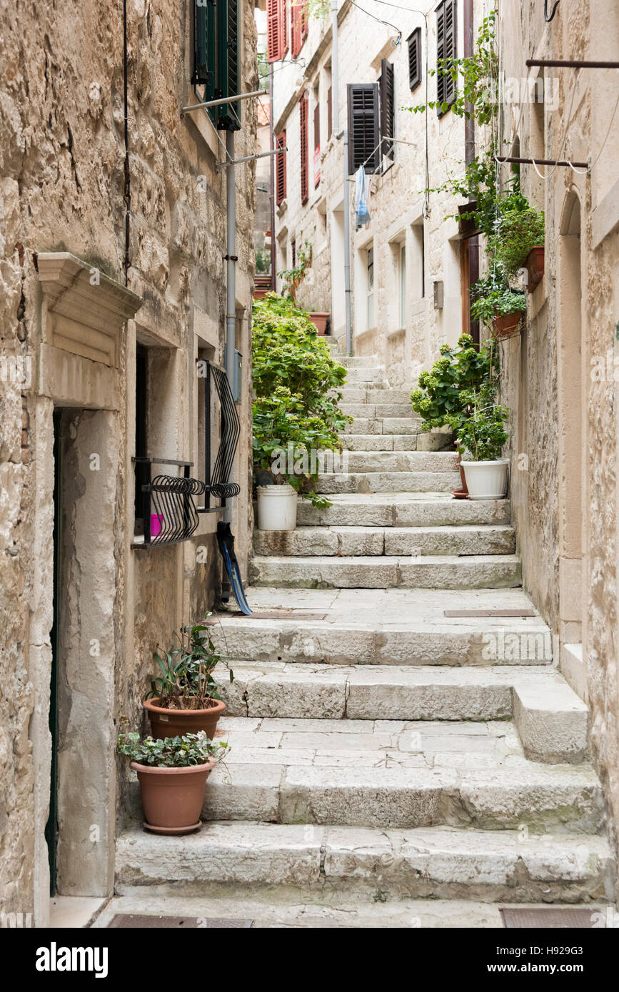 Old marble steps in a narrow alley in the ancient town of Korcula Croatia Stock Photo