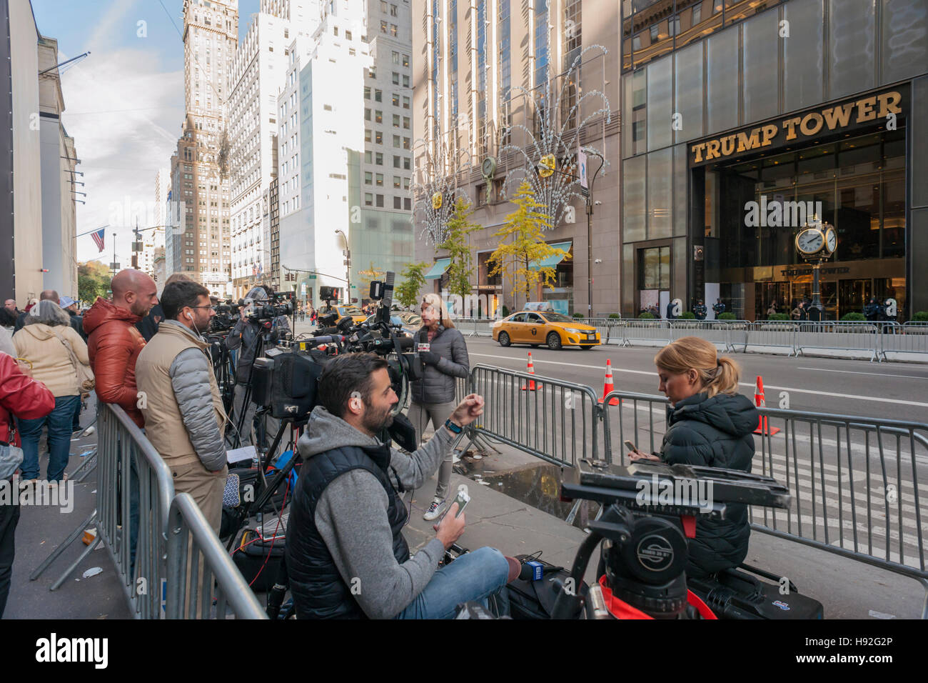 Media camped out across fromTrump Tower on Fifth Avenue in New York on Thursday, November 10, 2016. Security is tight due to President-elect Donald Trump living there. (© Richard B. Levine) Stock Photo