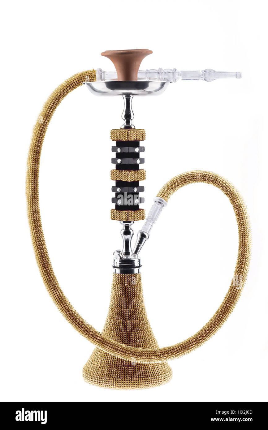 Smoke hookah on a black background with a beautiful smoke. Brown hookah bowl  for tobacco with long leg. Preparing the shisha, aka nargile or hookah at a  restaurant by placing the charcoals