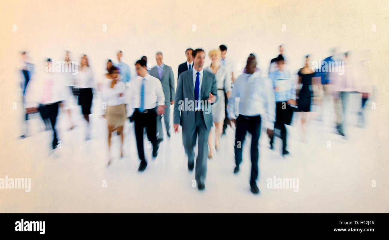 Large Group of Business People Walking Stock Photo - Alamy
