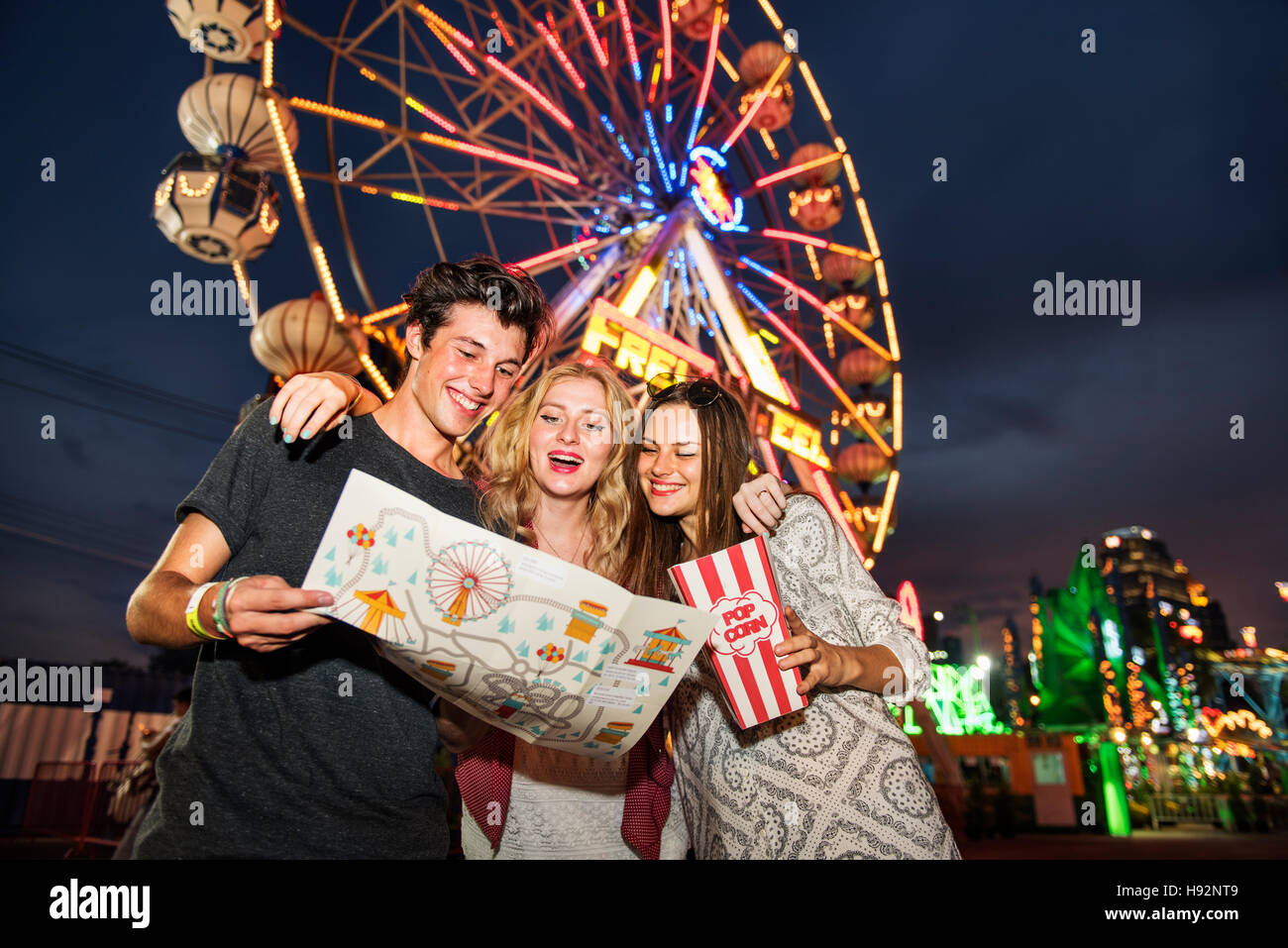 Amusement Park Friends Enjoyment Lifestyle Concept Stock Photo - Alamy
