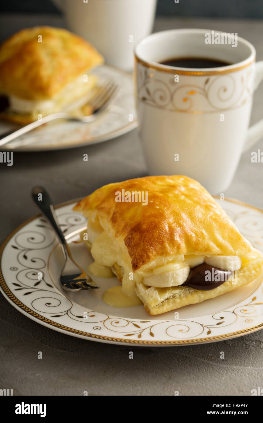 Puff pastry stacks with banana and chocolate Stock Photo - Alamy