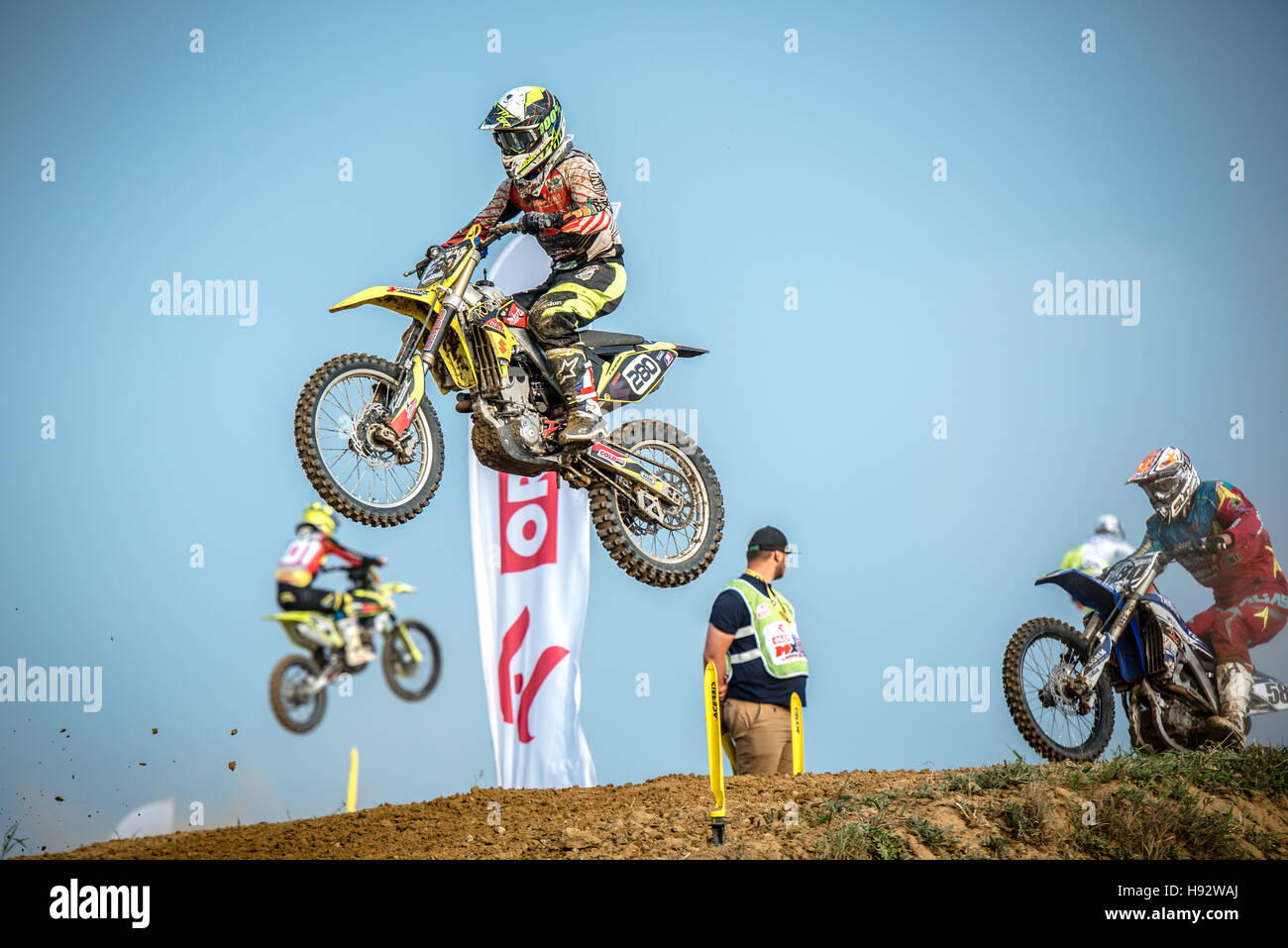 motocross riders in the race Stock Photo - Alamy