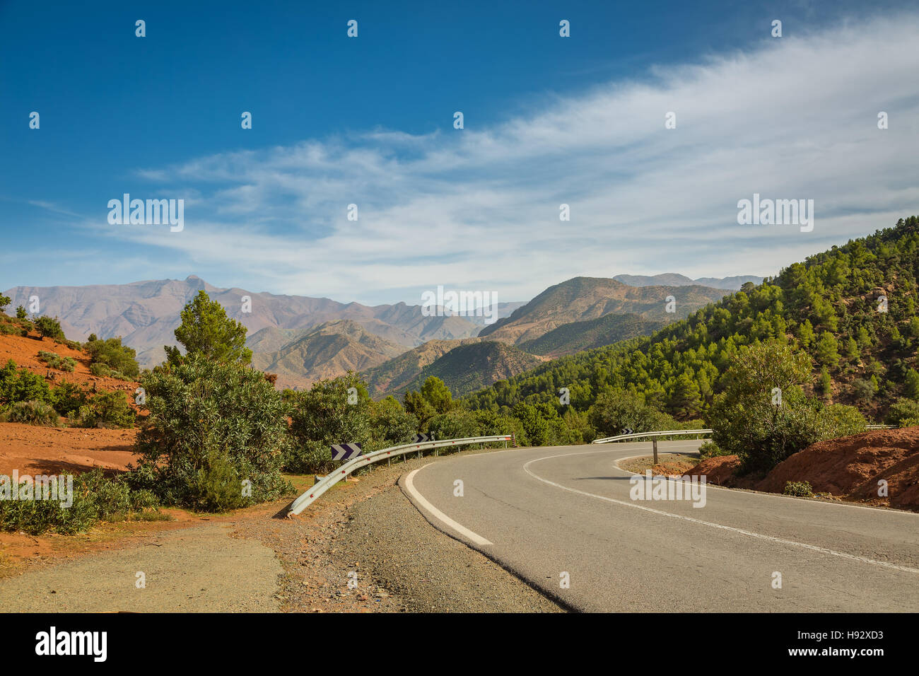 The road leading Atlas Mountains in Morocco. Roads in Morocco are in good technical condition. Stock Photo