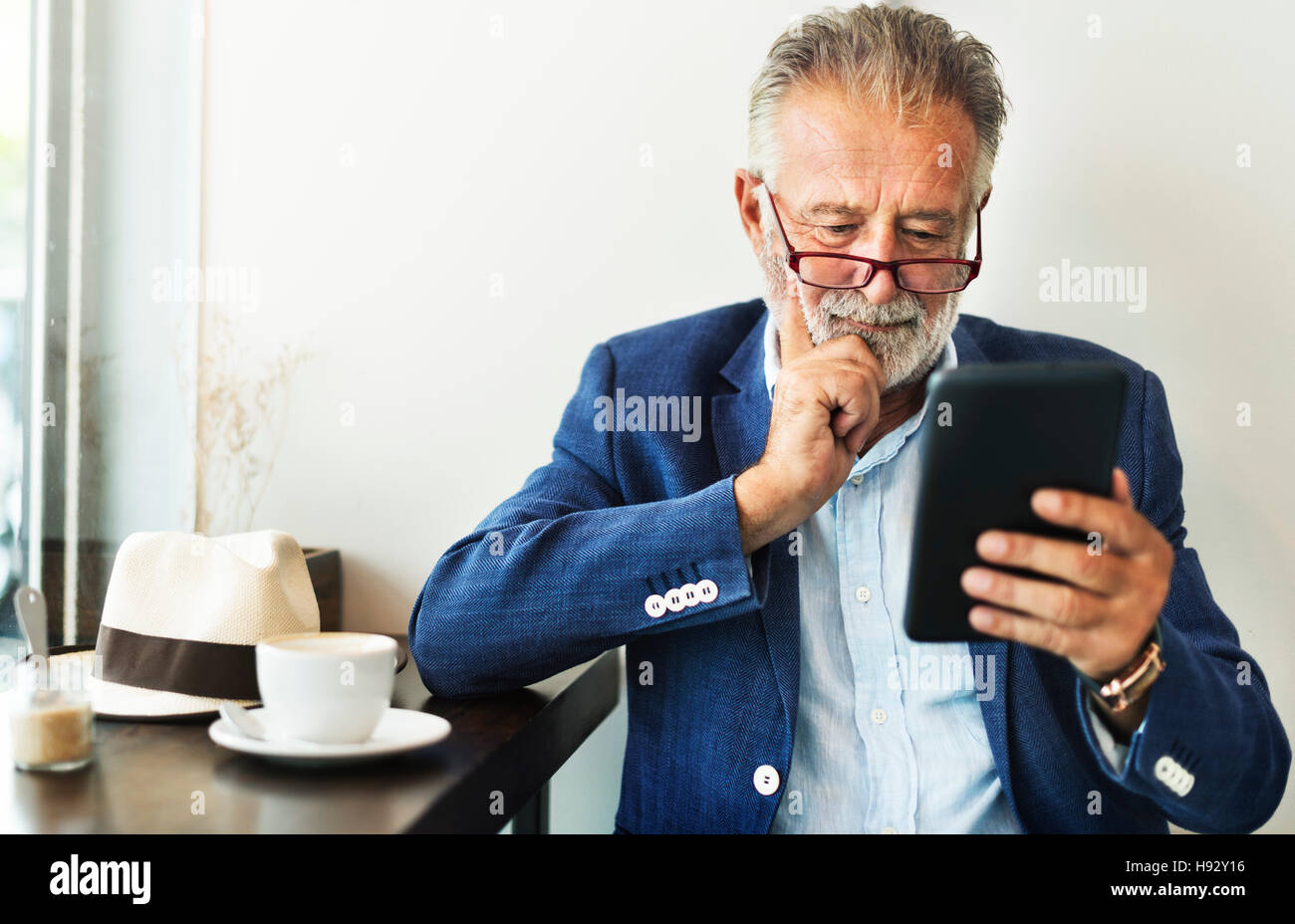 Old Man Coffee Shop Mobile Device Concept Stock Photo
