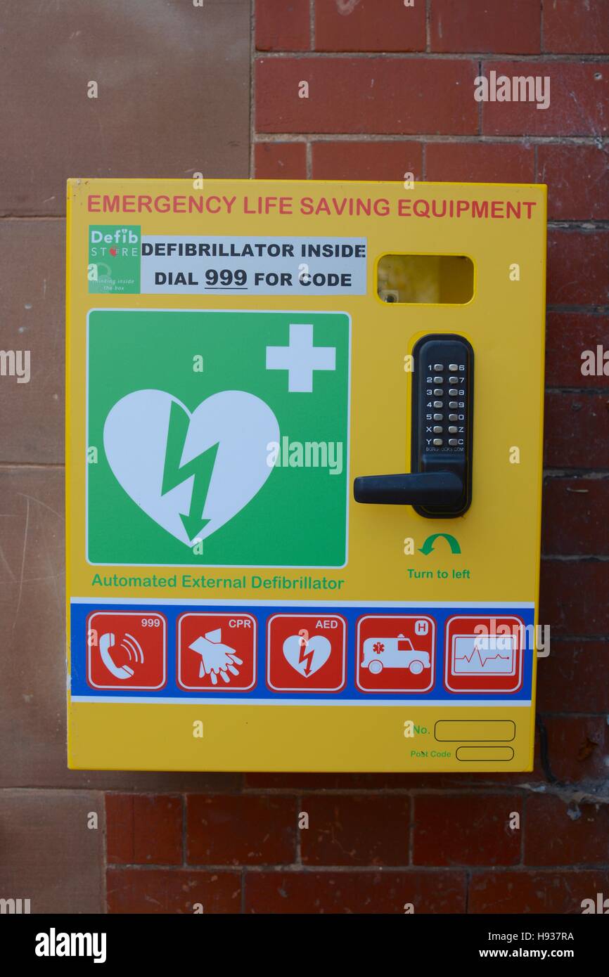Automated external defibrillator (AED) on wall in Nantwich town centre, Nantwich, Ceshire, UK Stock Photo